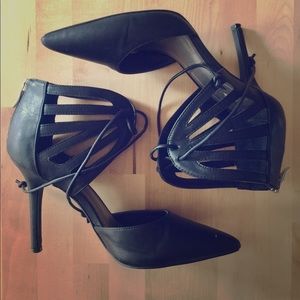 Closed toe heels with ankle-lace closure.